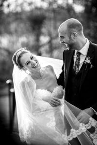 bride and groom laughing